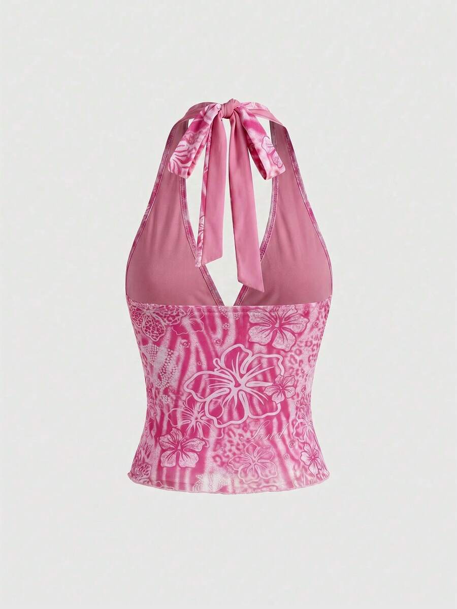 Women's pink tropical hibiscus print halter top featuring contrast lace trim and a slim fit silhouette.