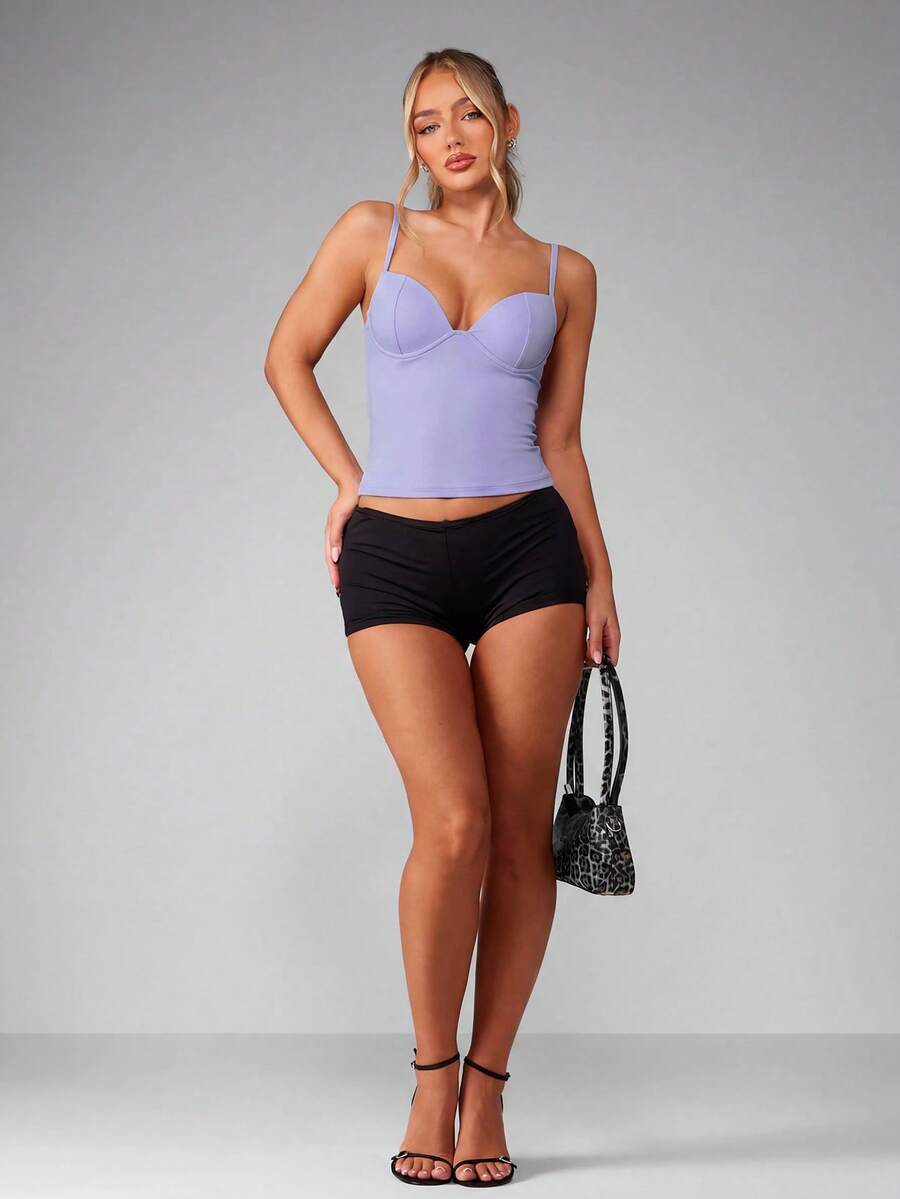 Women’s plain backless cami top with spaghetti straps and a slim fit, designed in high-stretch knitted fabric for casual beach and vacation wear.
