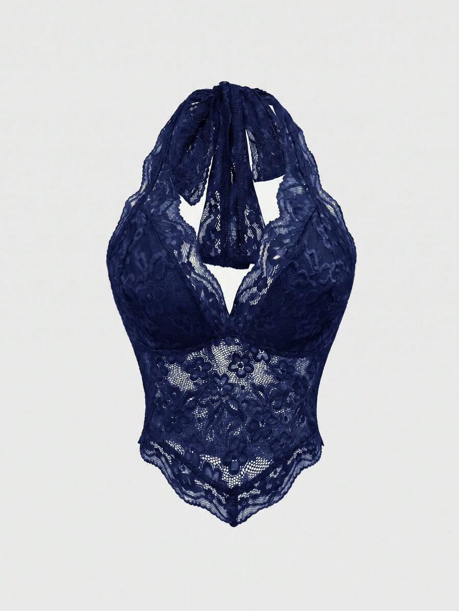 Women's black lace halter neck camisole featuring a backless crop silhouette, contrast lace trim, and scallop hem.