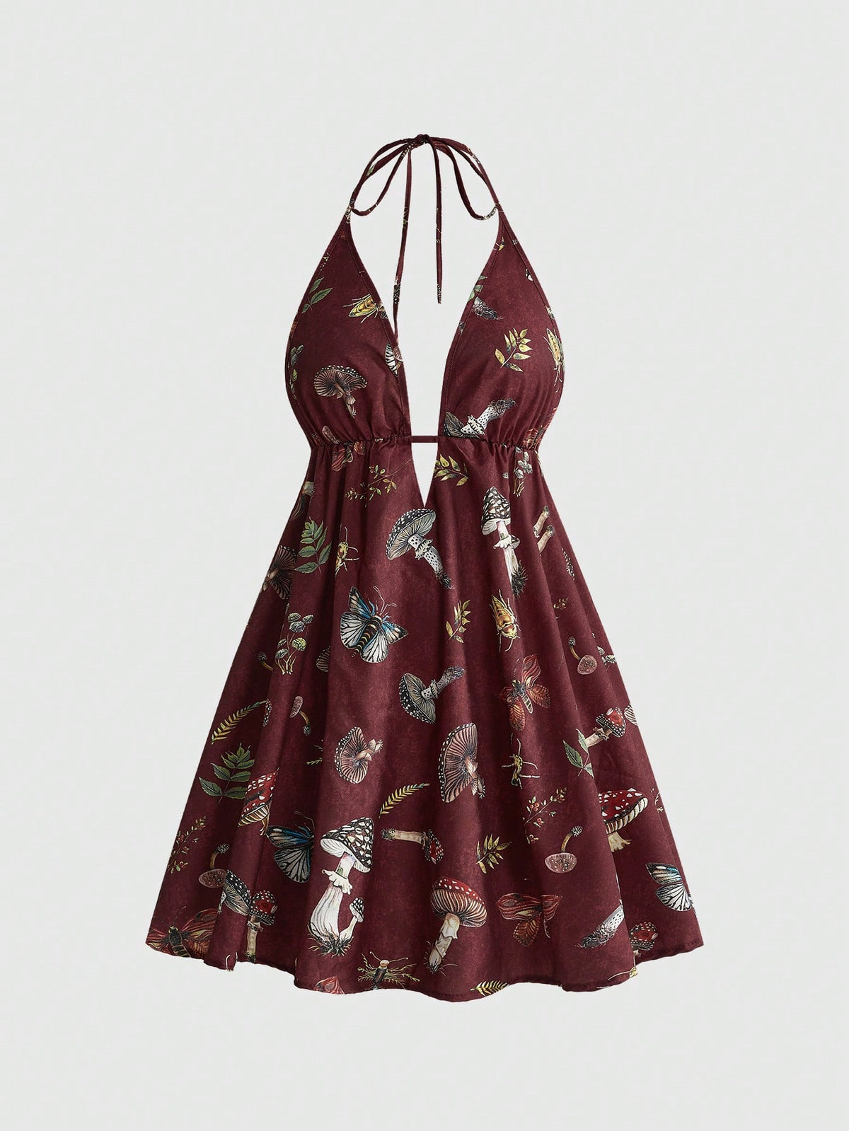 Black fairycore halter backless mini dress with mushroom, moth, and plant print featuring a high waist and flared hem.