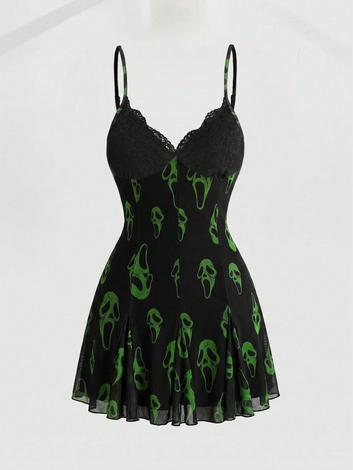 Women's black and white gothic cami mini dress featuring contrast lace trim, pleated details, high waist, and flared hem on high-stretch fabric.