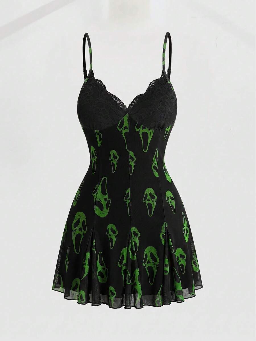 Women's black and white gothic cami mini dress featuring contrast lace trim, pleated details, high waist, and flared hem on high-stretch fabric.