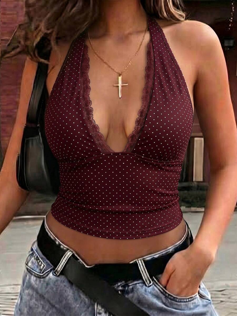 Women's sleeveless halter crop top featuring contrast lace trim and a slim fit design.