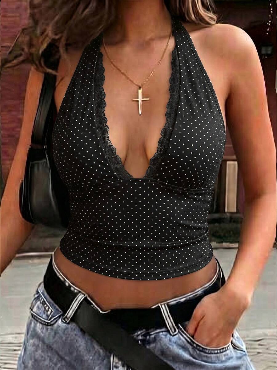 Women's sleeveless halter crop top featuring contrast lace trim and a slim fit design.