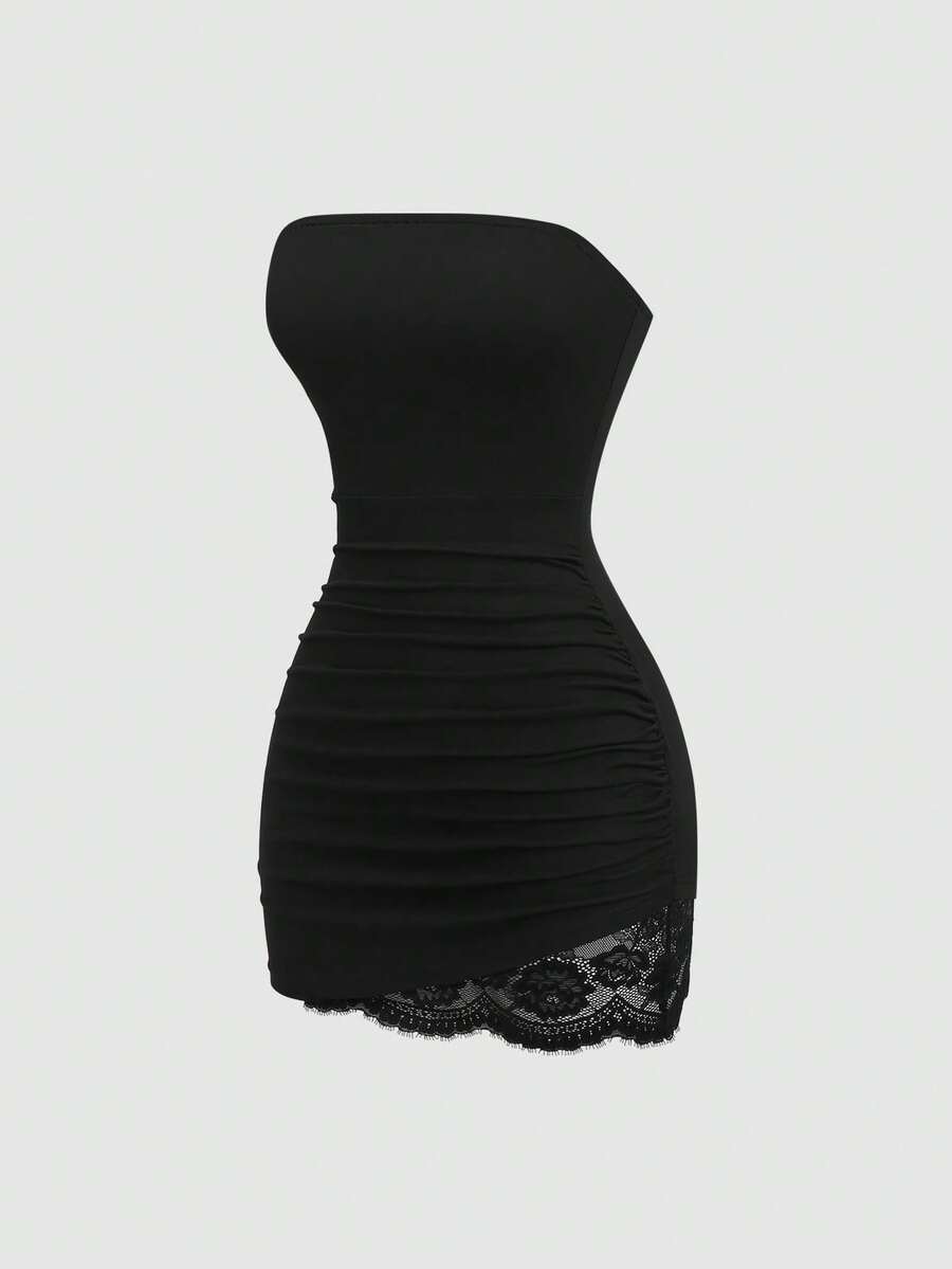 Black strapless bodycon mini dress for women featuring contrast lace patchwork and ruched asymmetrical detailing.