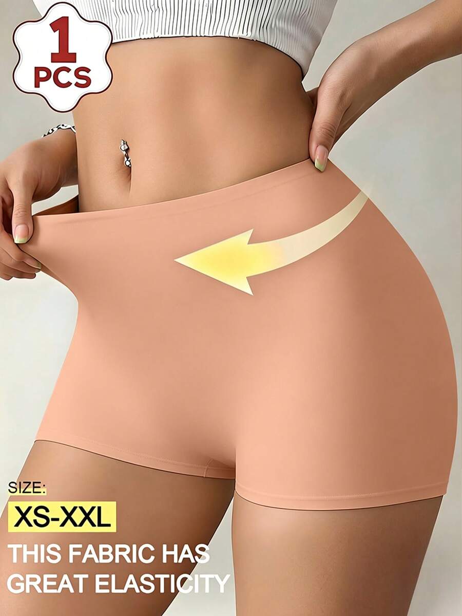 Women's black high stretch shapewear shorts with a mid waist fit and semi-sheer fabric.