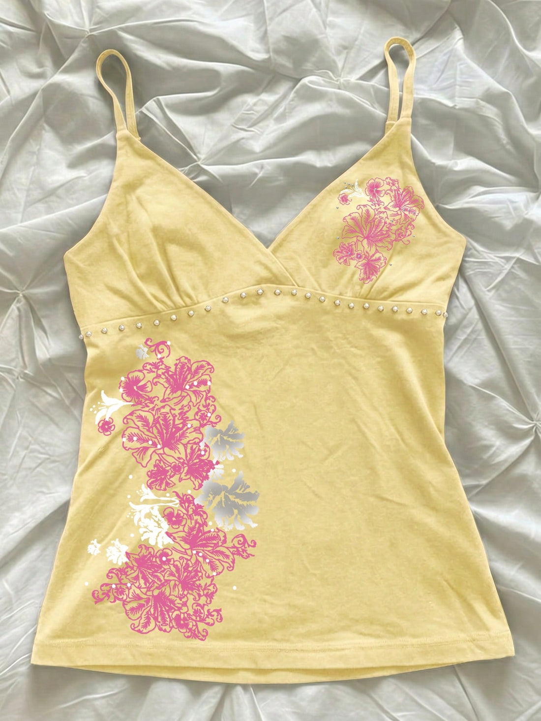 Women's slim fit spaghetti strap cami top featuring a tropical hibiscus floral graphic print.