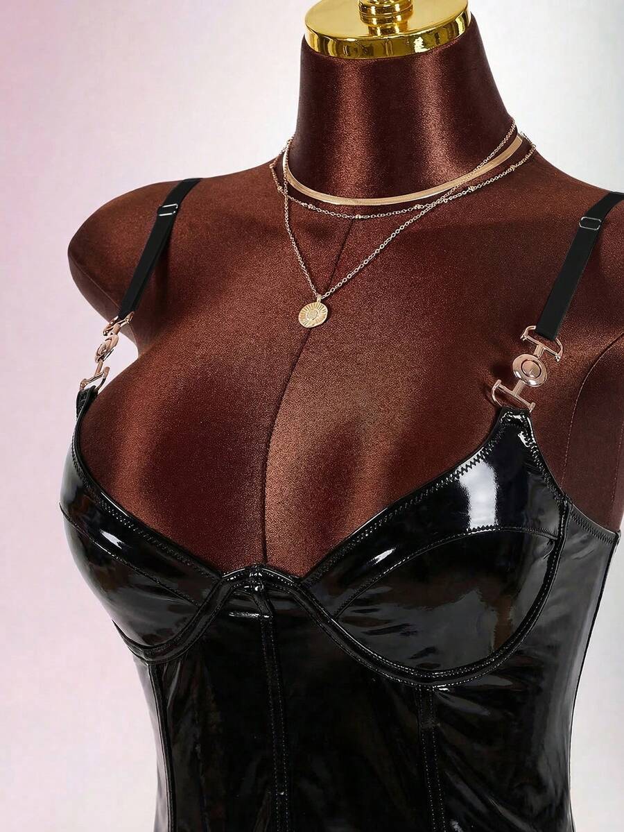 Women's sleeveless spaghetti strap mini bodycon dress featuring cup details, backless design, and zipper closure.