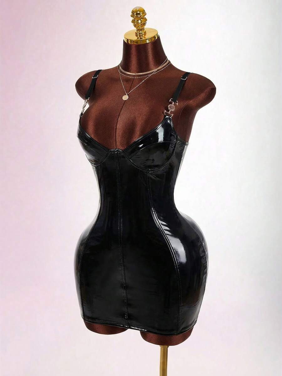 Women's sleeveless spaghetti strap mini bodycon dress featuring cup details, backless design, and zipper closure.