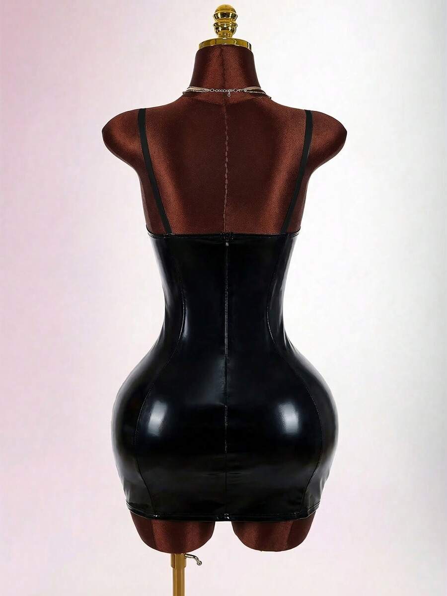 Women's sleeveless spaghetti strap mini bodycon dress featuring cup details, backless design, and zipper closure.