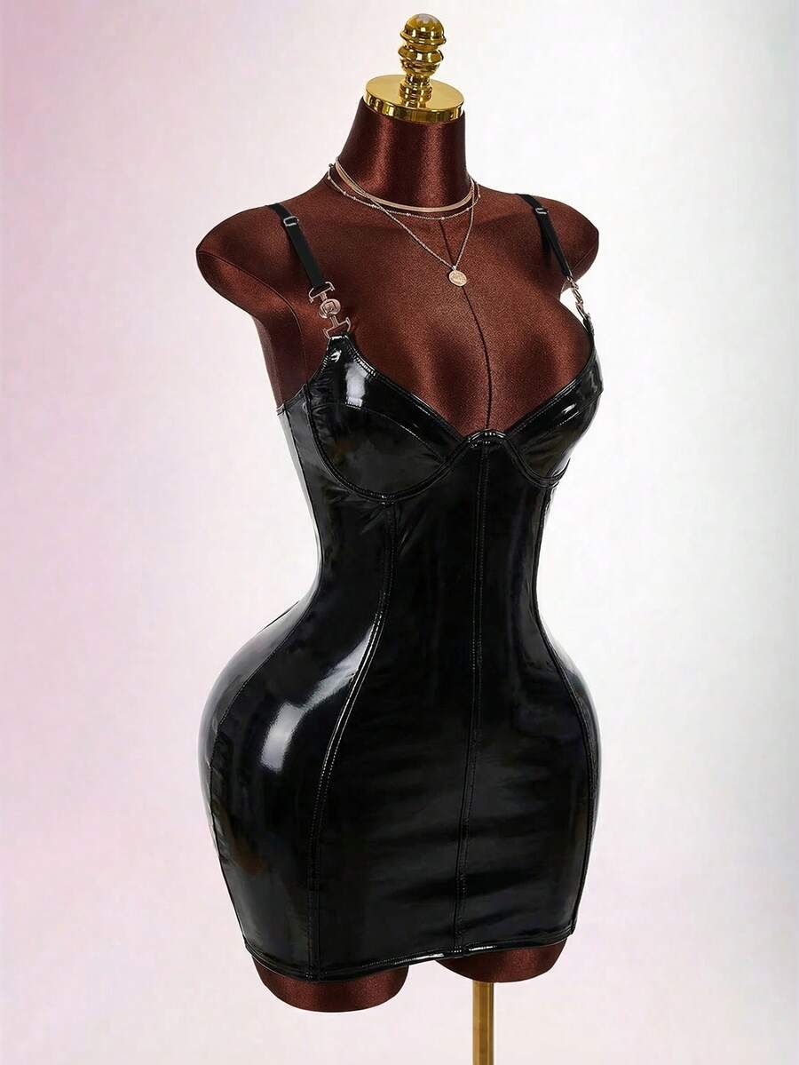 Women's sleeveless spaghetti strap mini bodycon dress featuring cup details, backless design, and zipper closure.