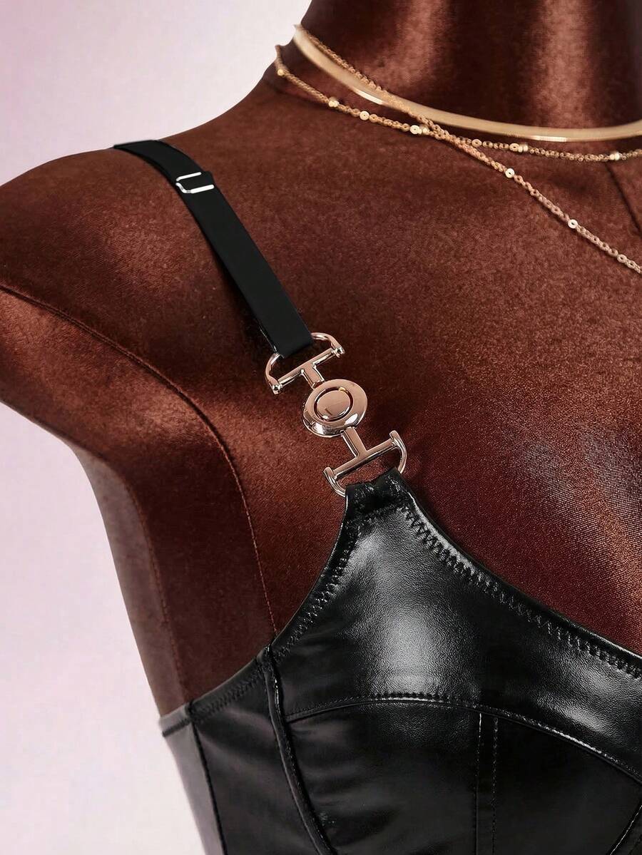 Women's sleeveless spaghetti strap mini bodycon dress featuring cup details, backless design, and zipper closure.