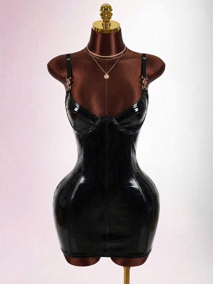 Women's sleeveless spaghetti strap mini bodycon dress featuring cup details, backless design, and zipper closure.