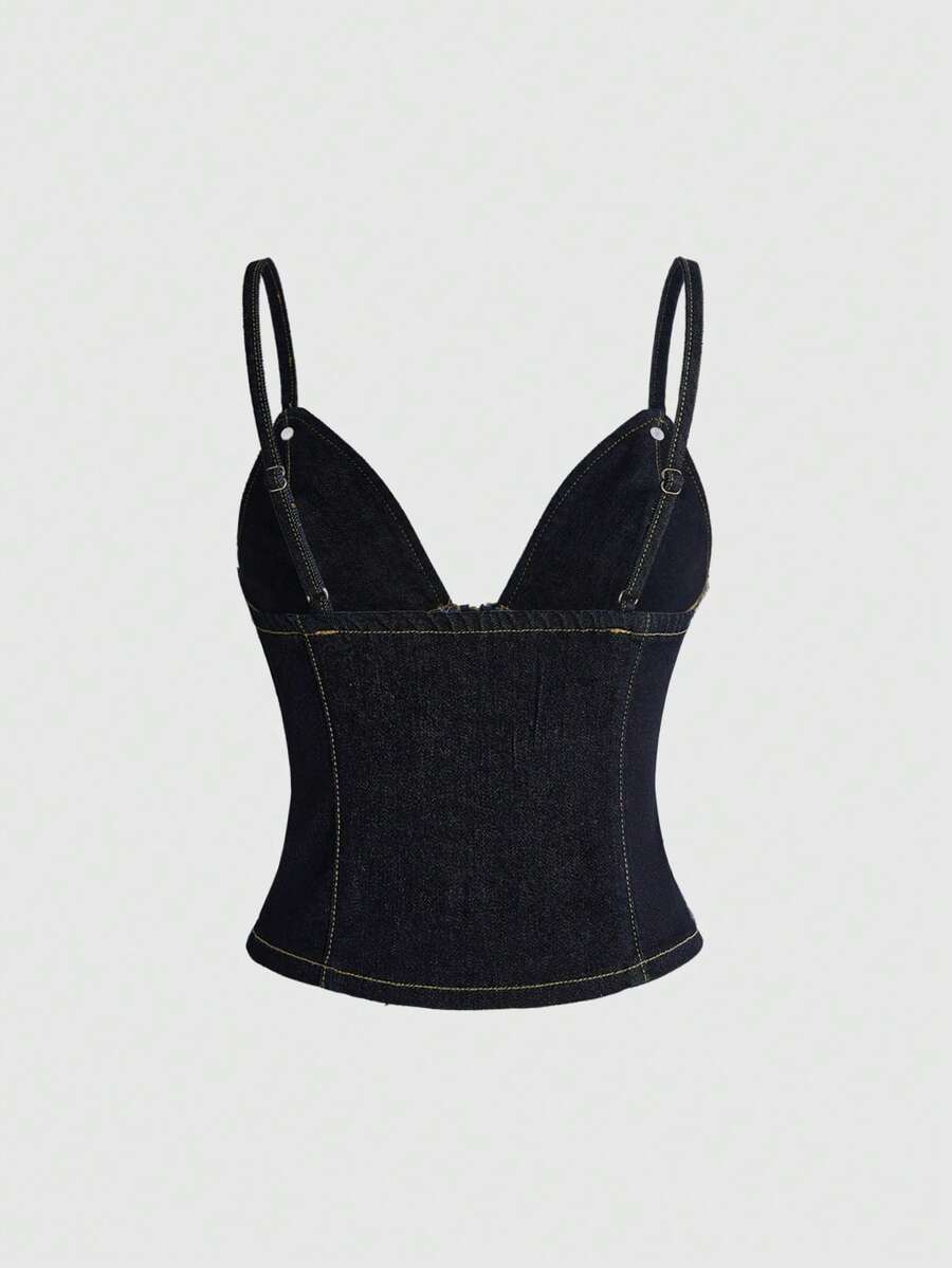 Women's blue fitted denim camisole top featuring metal buckle details, ruched cup design, zipper placket, and thin spaghetti straps.