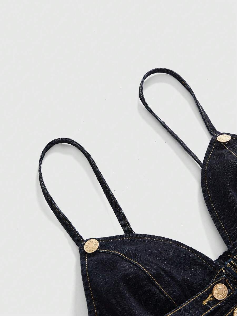Women's blue fitted denim camisole top featuring metal buckle details, ruched cup design, zipper placket, and thin spaghetti straps.
