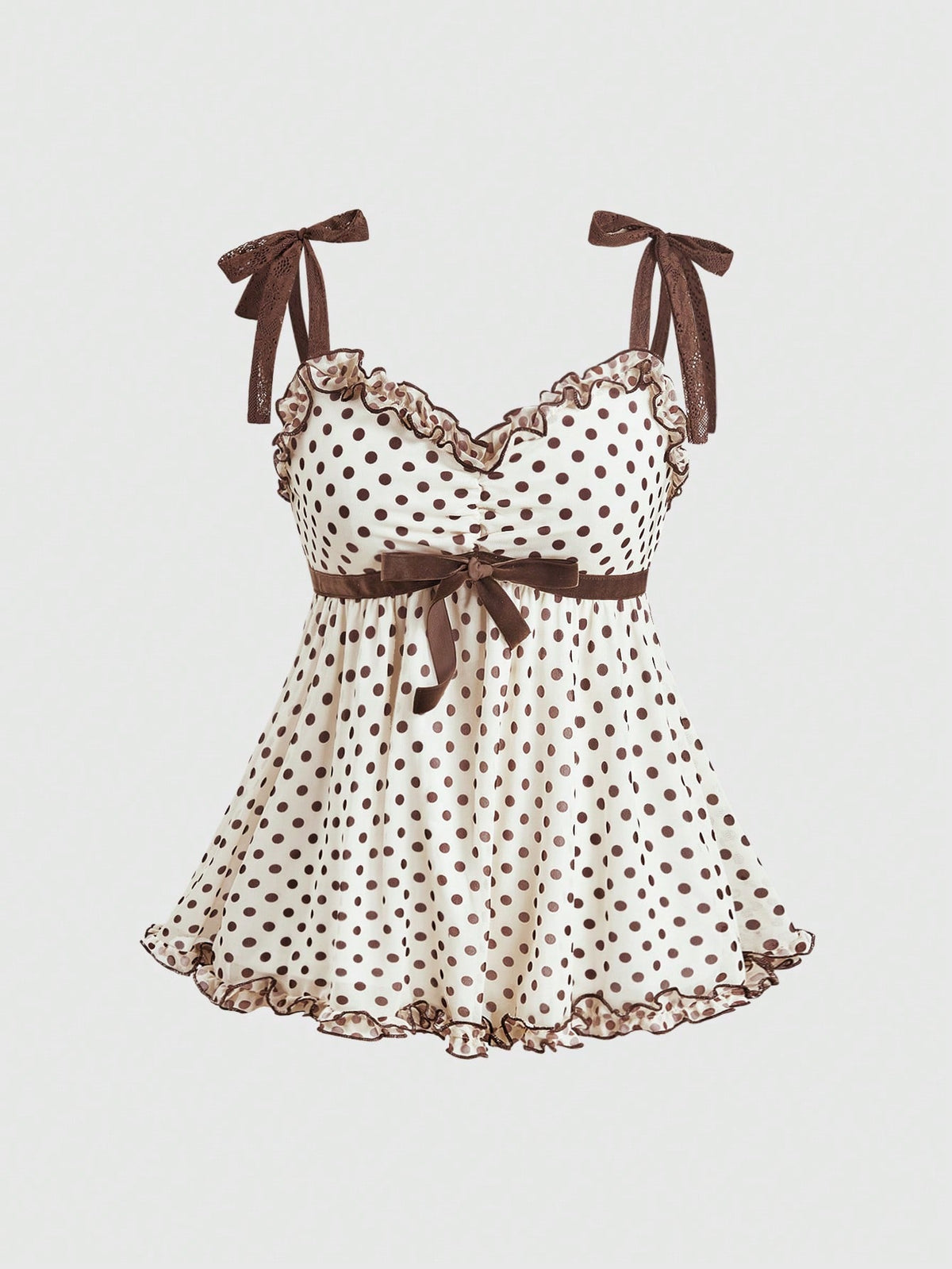 Women's apricot mesh tank top with polka dot print, featuring knot tie straps and a flared ruffle hem.