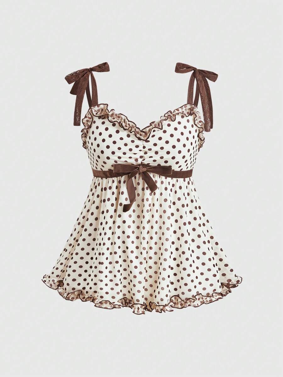 Women's apricot mesh tank top with polka dot print, featuring knot tie straps and a flared ruffle hem.