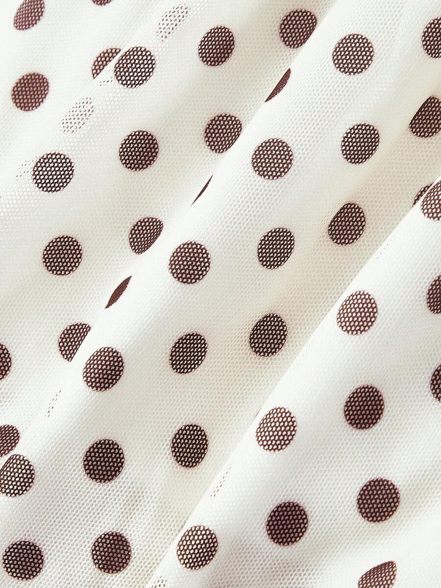 Women's apricot mesh tank top with polka dot print, featuring knot tie straps and a flared ruffle hem.