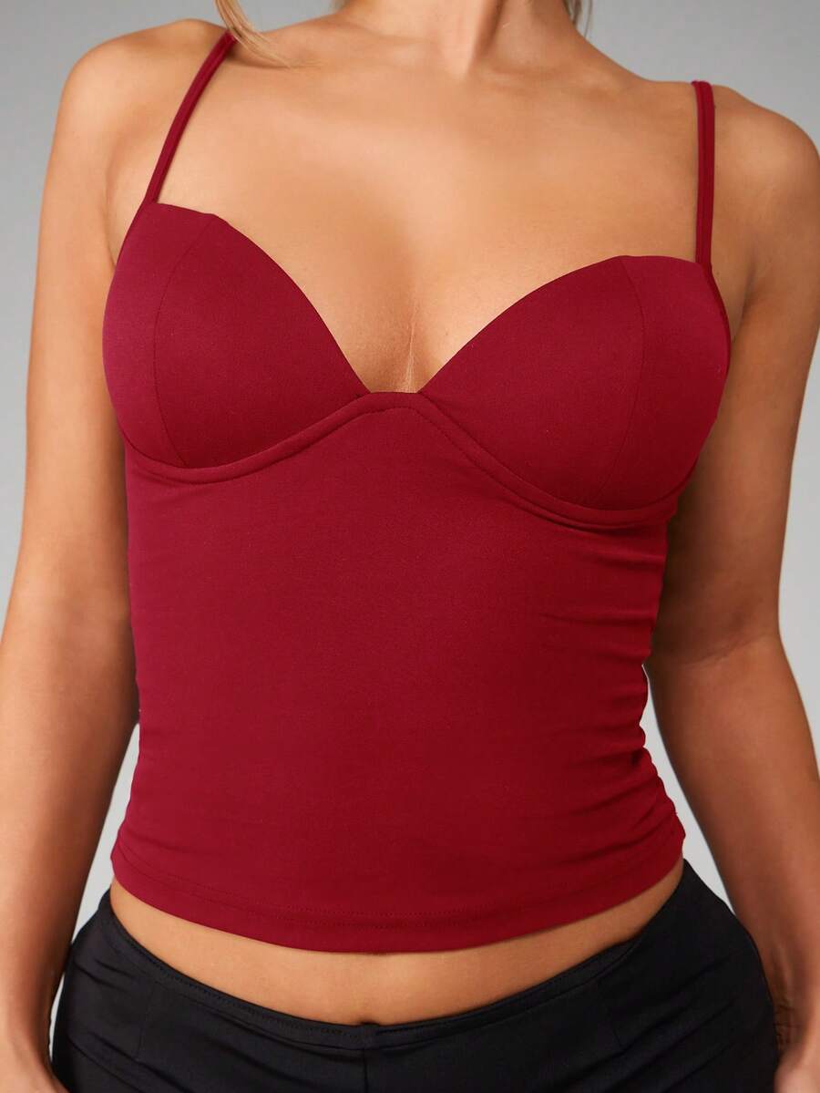Women’s plain backless cami top with spaghetti straps and a slim fit, designed in high-stretch knitted fabric for casual beach and vacation wear.