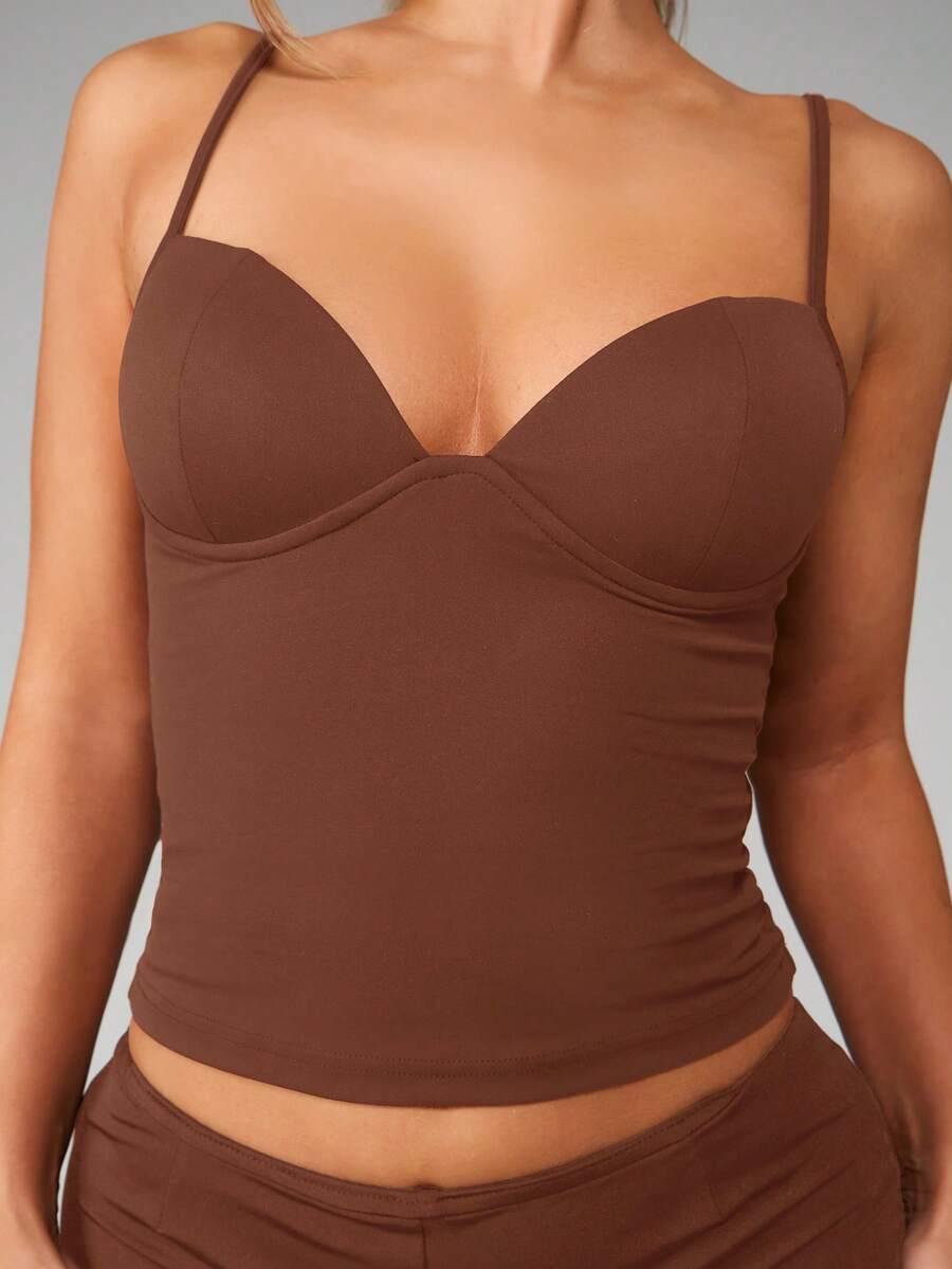 Women’s plain backless cami top with spaghetti straps and a slim fit, designed in high-stretch knitted fabric for casual beach and vacation wear.