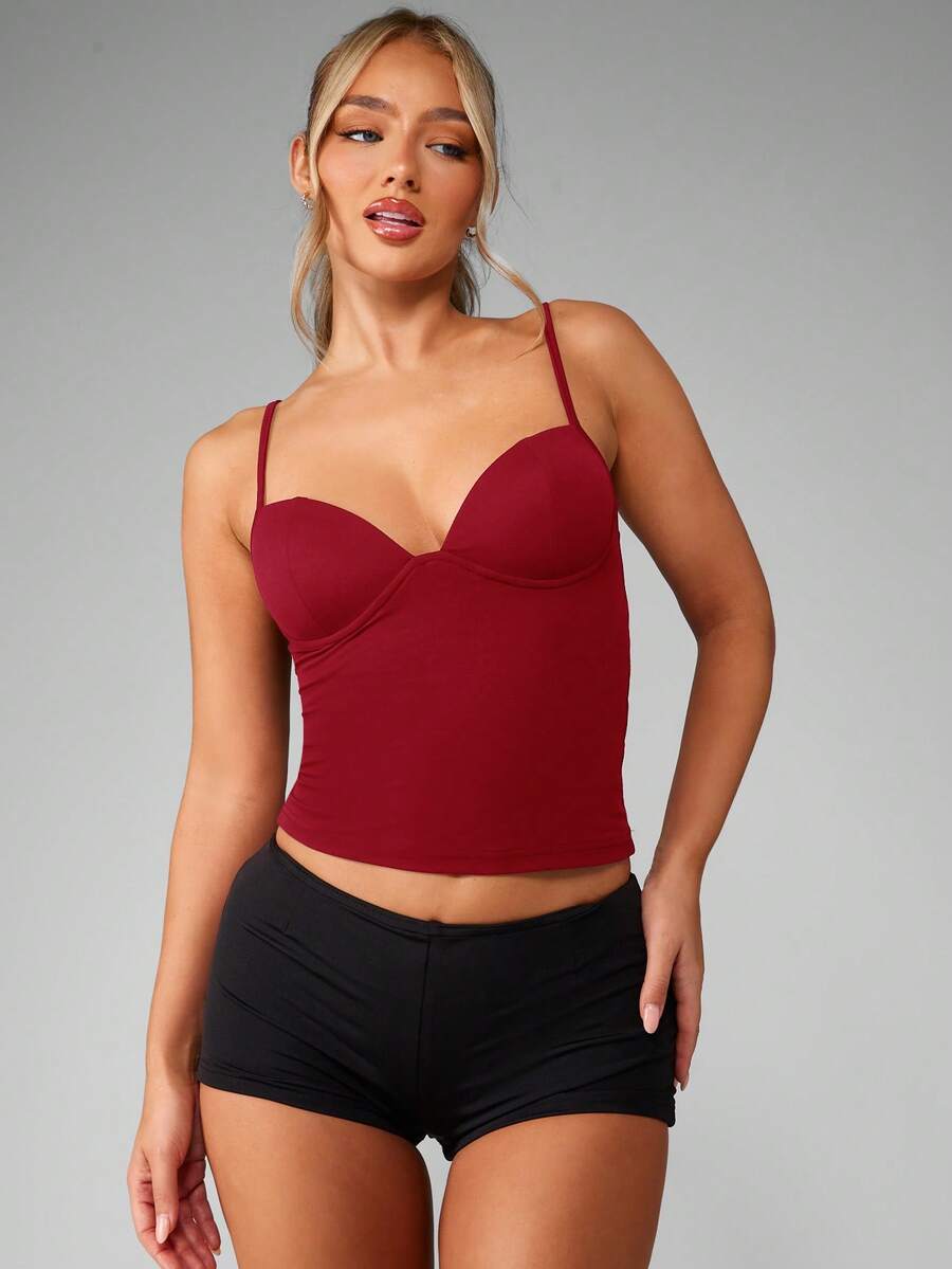 Women’s plain backless cami top with spaghetti straps and a slim fit, designed in high-stretch knitted fabric for casual beach and vacation wear.