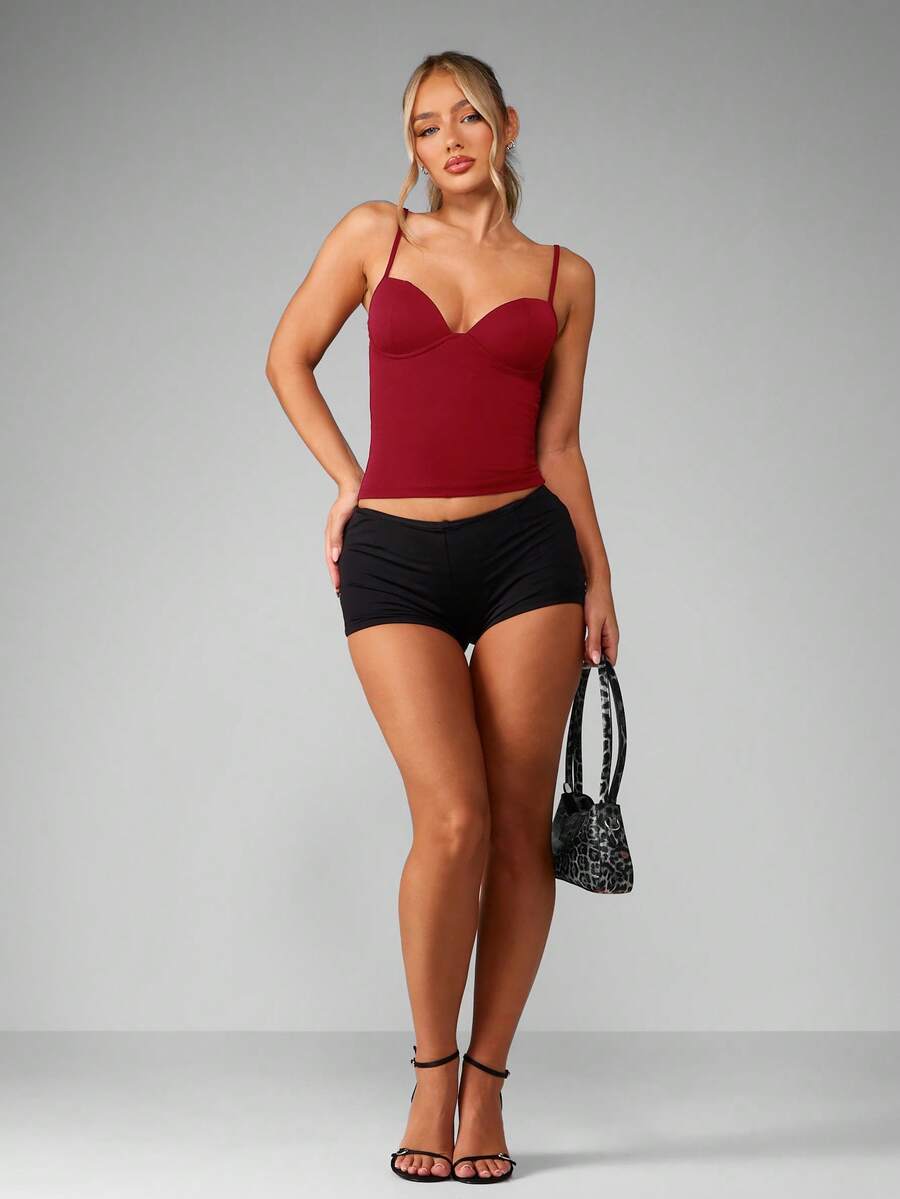Women’s plain backless cami top with spaghetti straps and a slim fit, designed in high-stretch knitted fabric for casual beach and vacation wear.