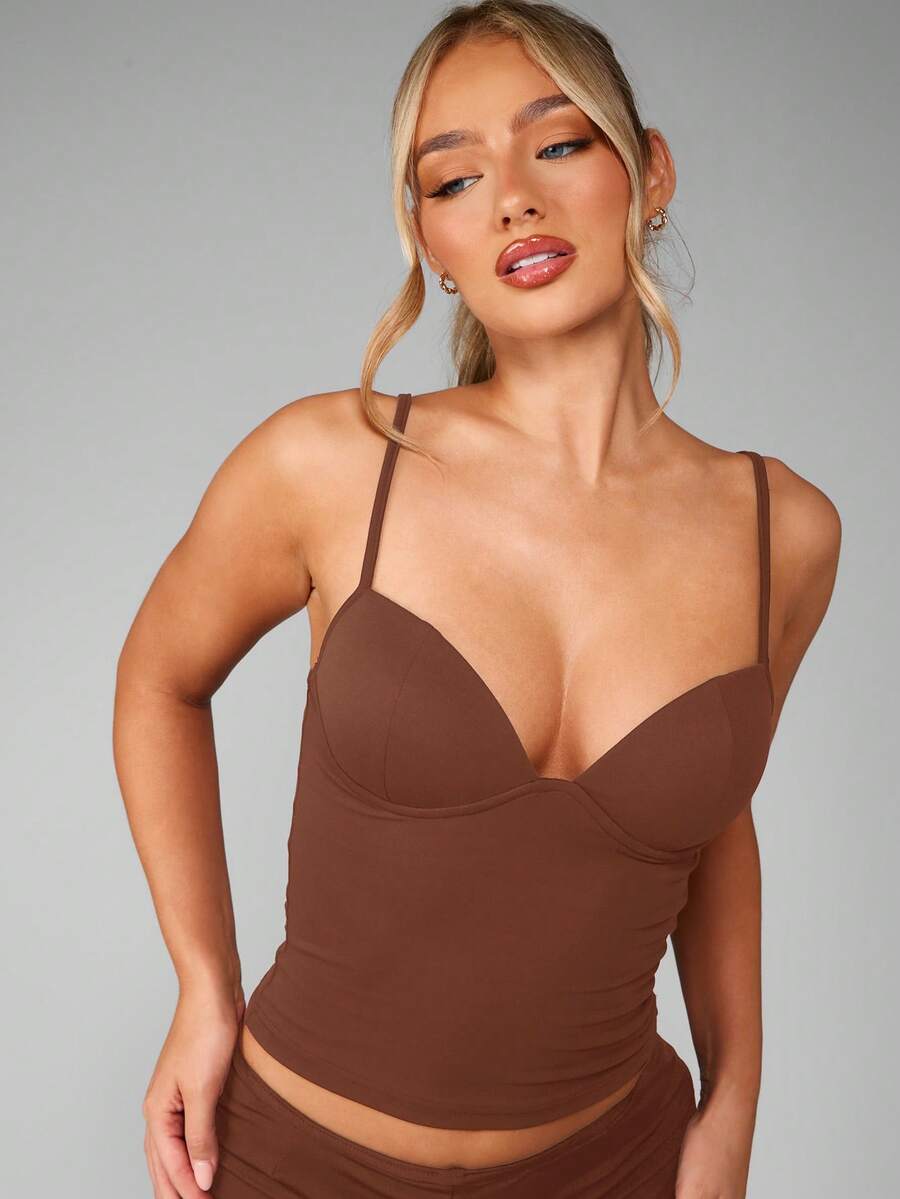 Women’s plain backless cami top with spaghetti straps and a slim fit, designed in high-stretch knitted fabric for casual beach and vacation wear.
