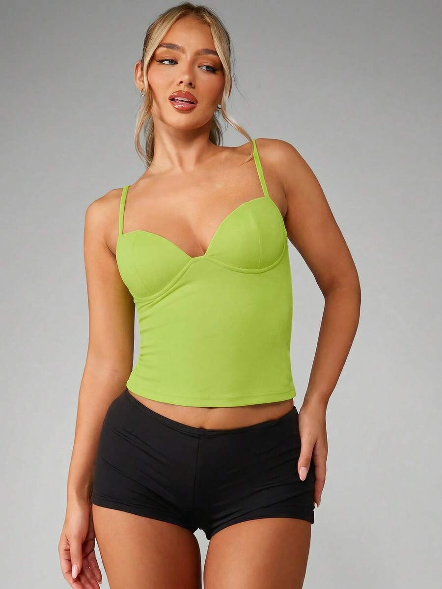 Women’s plain backless cami top with spaghetti straps and a slim fit, designed in high-stretch knitted fabric for casual beach and vacation wear.