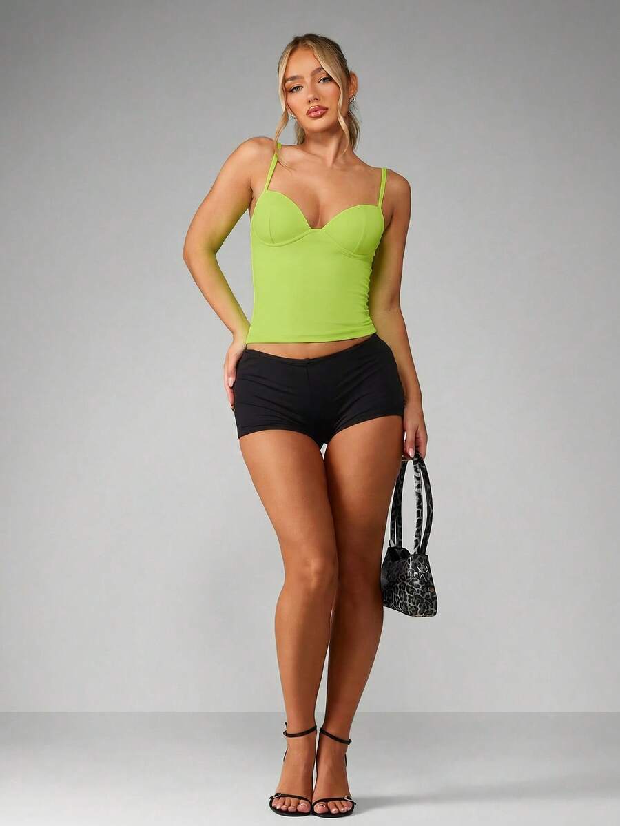 Women’s plain backless cami top with spaghetti straps and a slim fit, designed in high-stretch knitted fabric for casual beach and vacation wear.