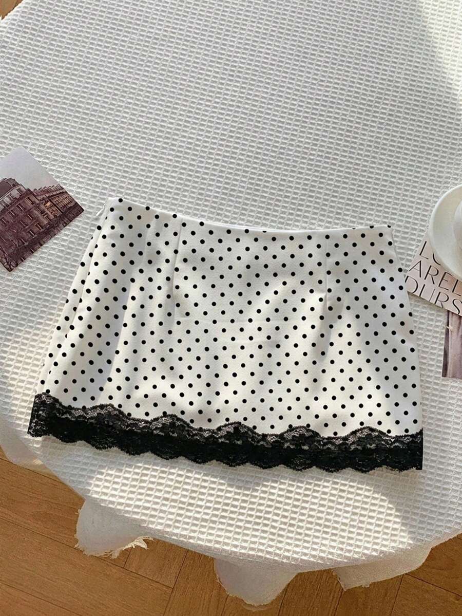 Women's white 100% cotton low waist mini skirt featuring a tropical print and zipper detail.
