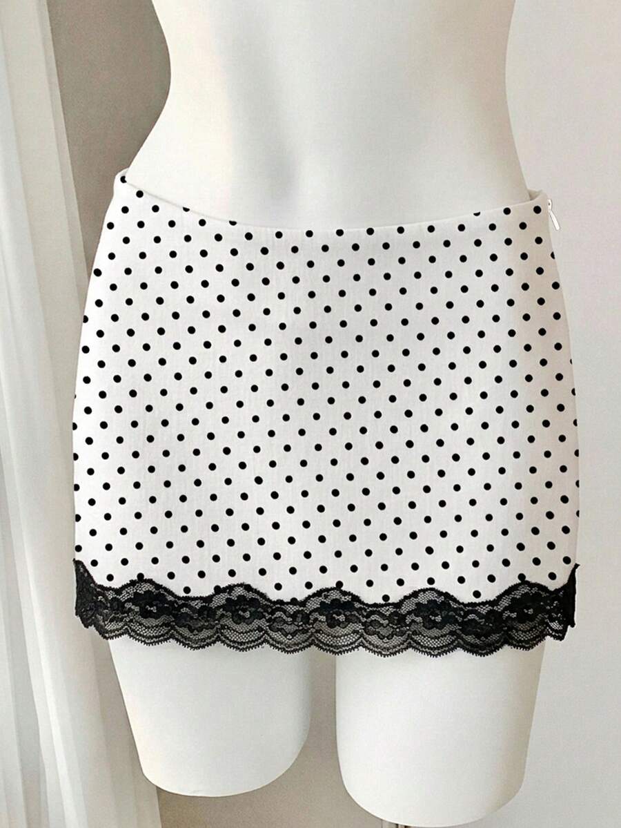 Women's white 100% cotton low waist mini skirt featuring a tropical print and zipper detail.