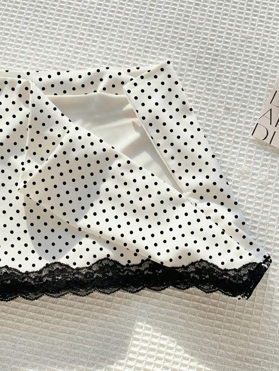Women's white 100% cotton low waist mini skirt featuring a tropical print and zipper detail.