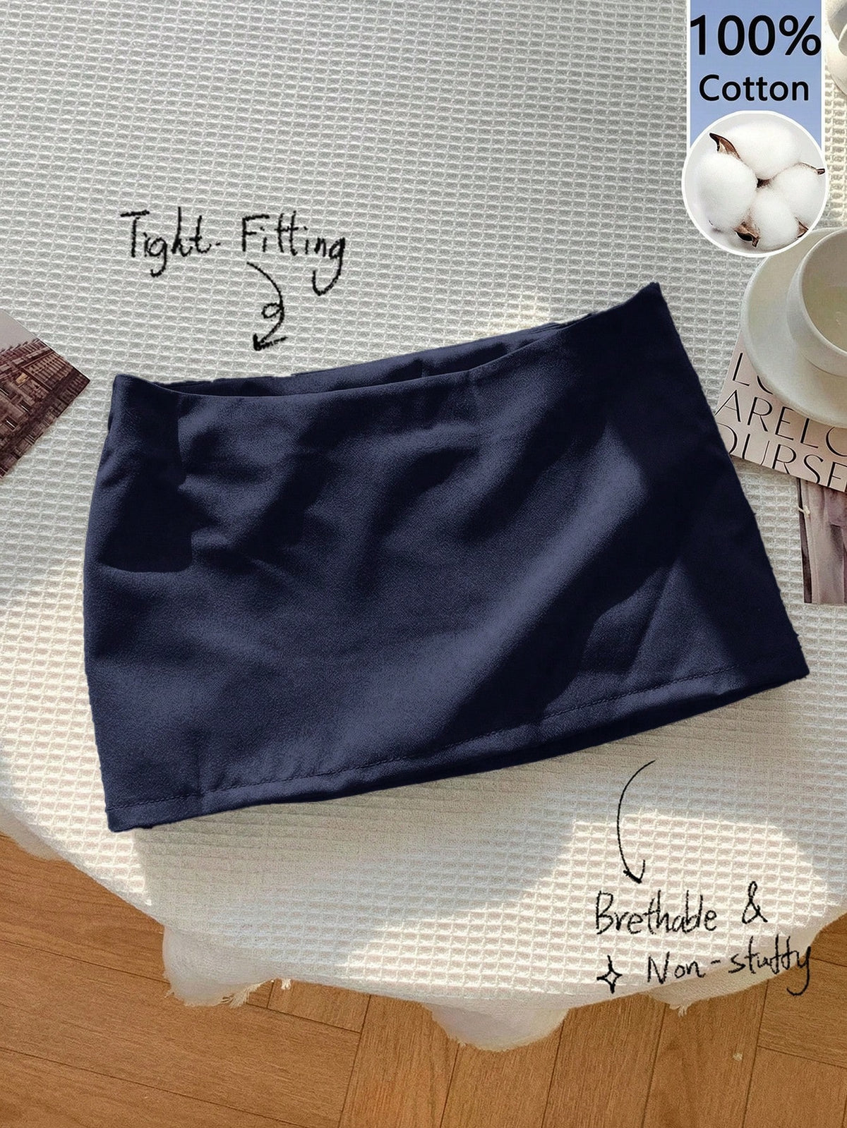 Women's white 100% cotton low waist mini skirt featuring a tropical print and zipper detail.