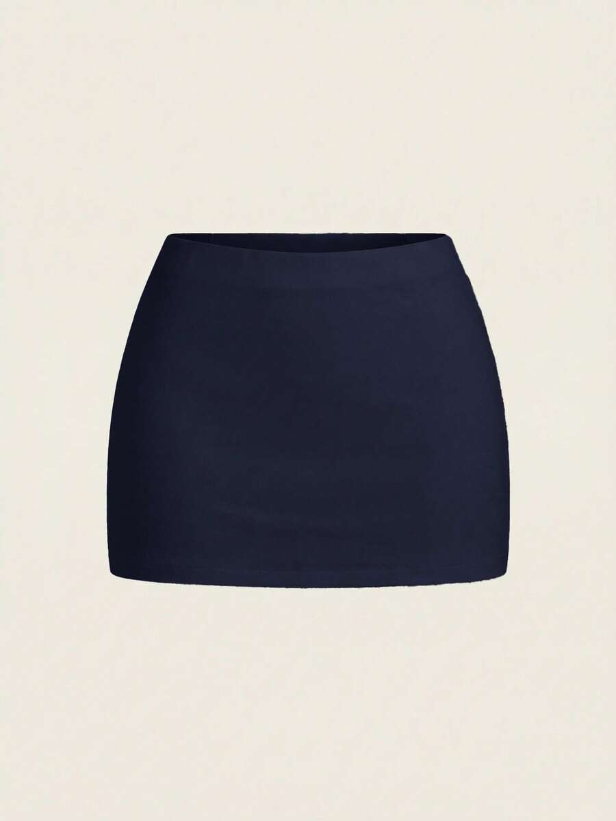 Women's white 100% cotton low waist mini skirt featuring a tropical print and zipper detail.