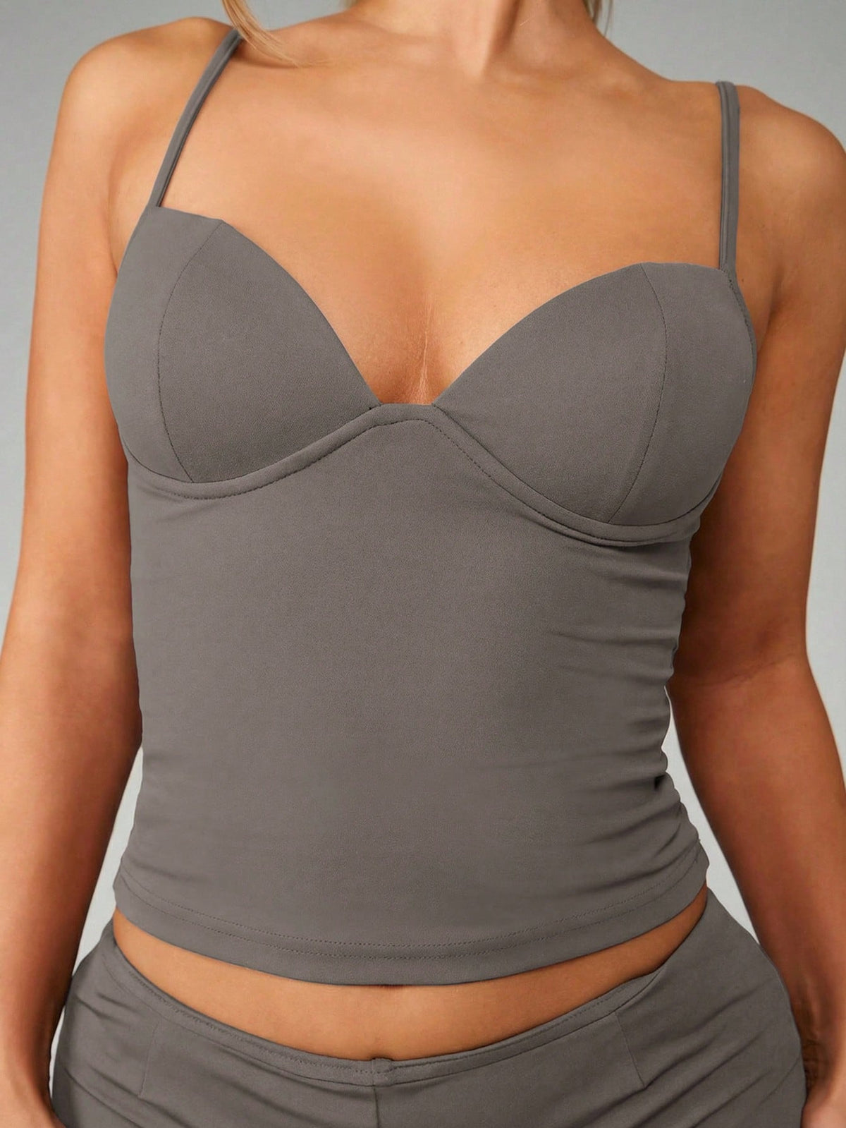 Women’s plain backless cami top with spaghetti straps and a slim fit, designed in high-stretch knitted fabric for casual beach and vacation wear.