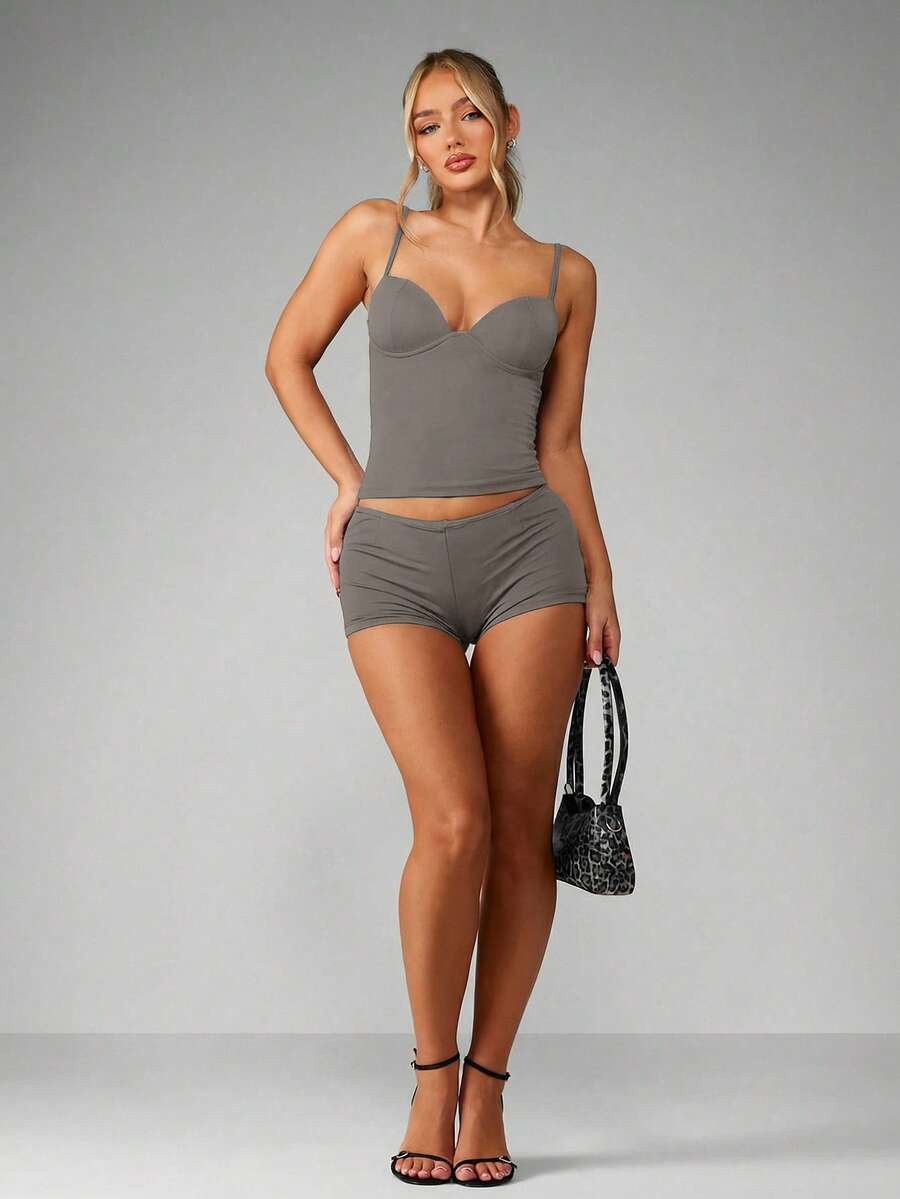 Women’s plain backless cami top with spaghetti straps and a slim fit, designed in high-stretch knitted fabric for casual beach and vacation wear.