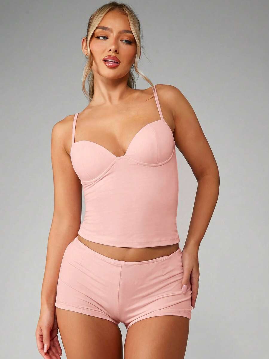 Women’s plain backless cami top with spaghetti straps and a slim fit, designed in high-stretch knitted fabric for casual beach and vacation wear.