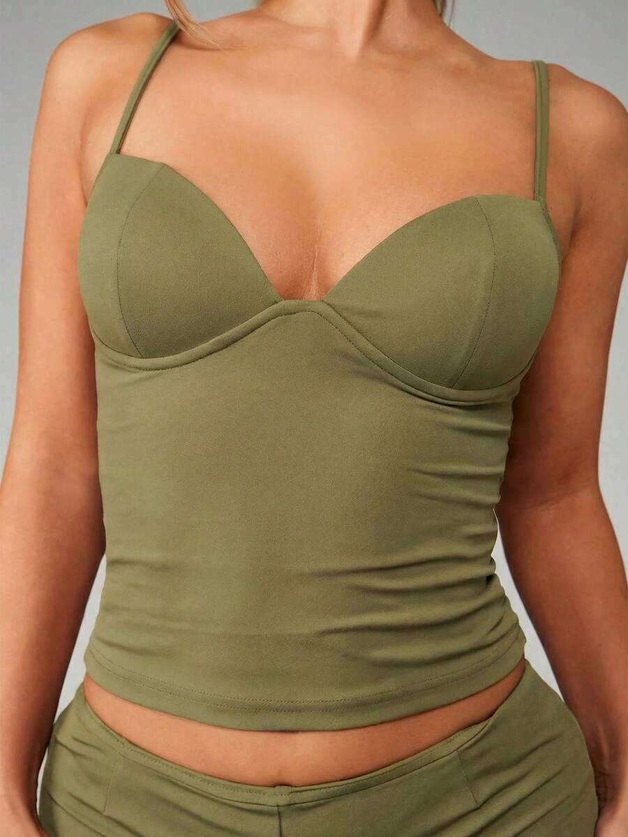 Women’s plain backless cami top with spaghetti straps and a slim fit, designed in high-stretch knitted fabric for casual beach and vacation wear.