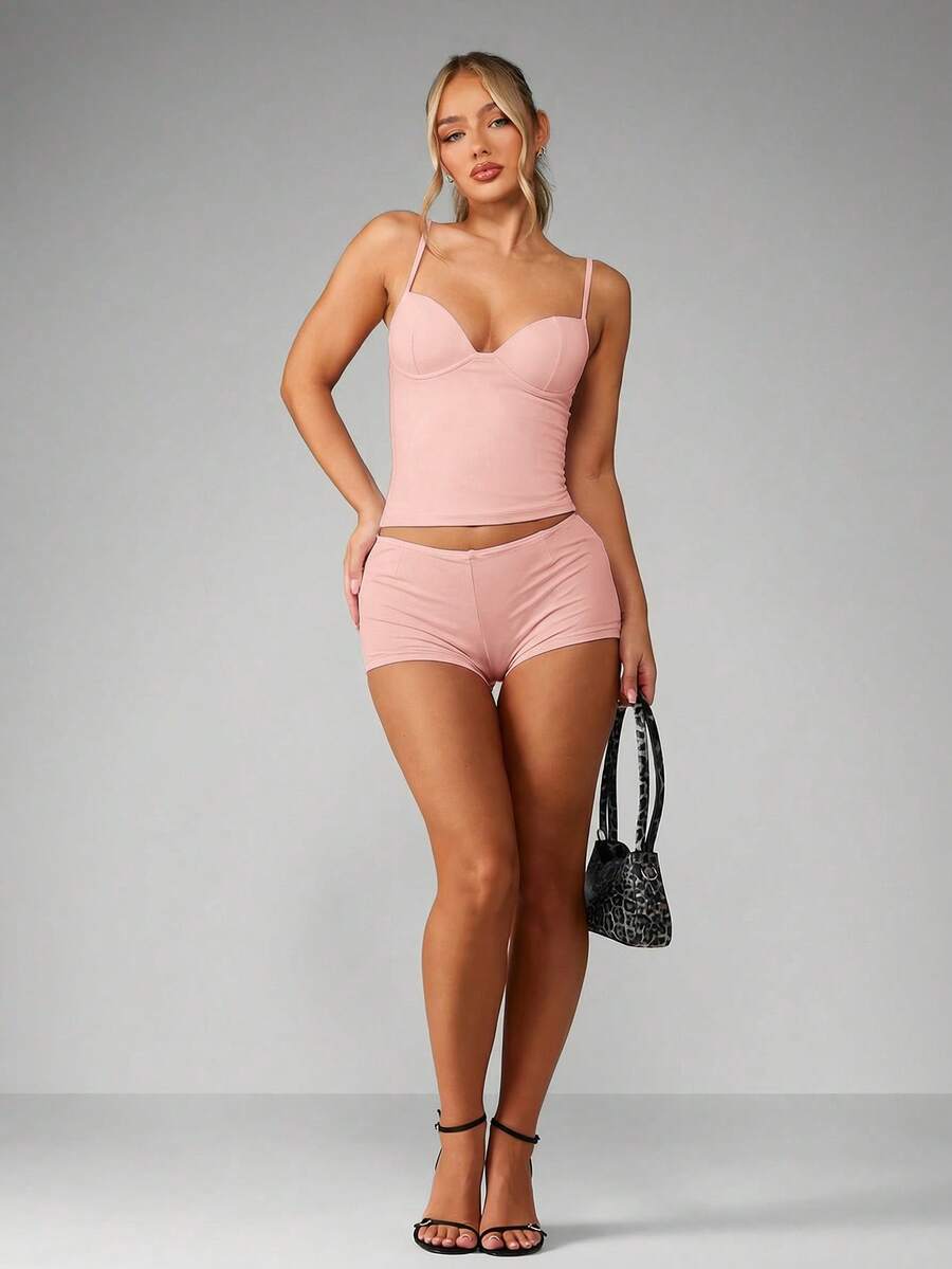 Women’s plain backless cami top with spaghetti straps and a slim fit, designed in high-stretch knitted fabric for casual beach and vacation wear.