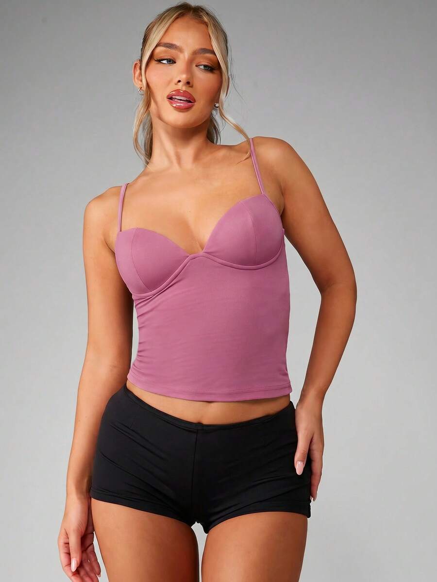 Women’s plain backless cami top with spaghetti straps and a slim fit, designed in high-stretch knitted fabric for casual beach and vacation wear.