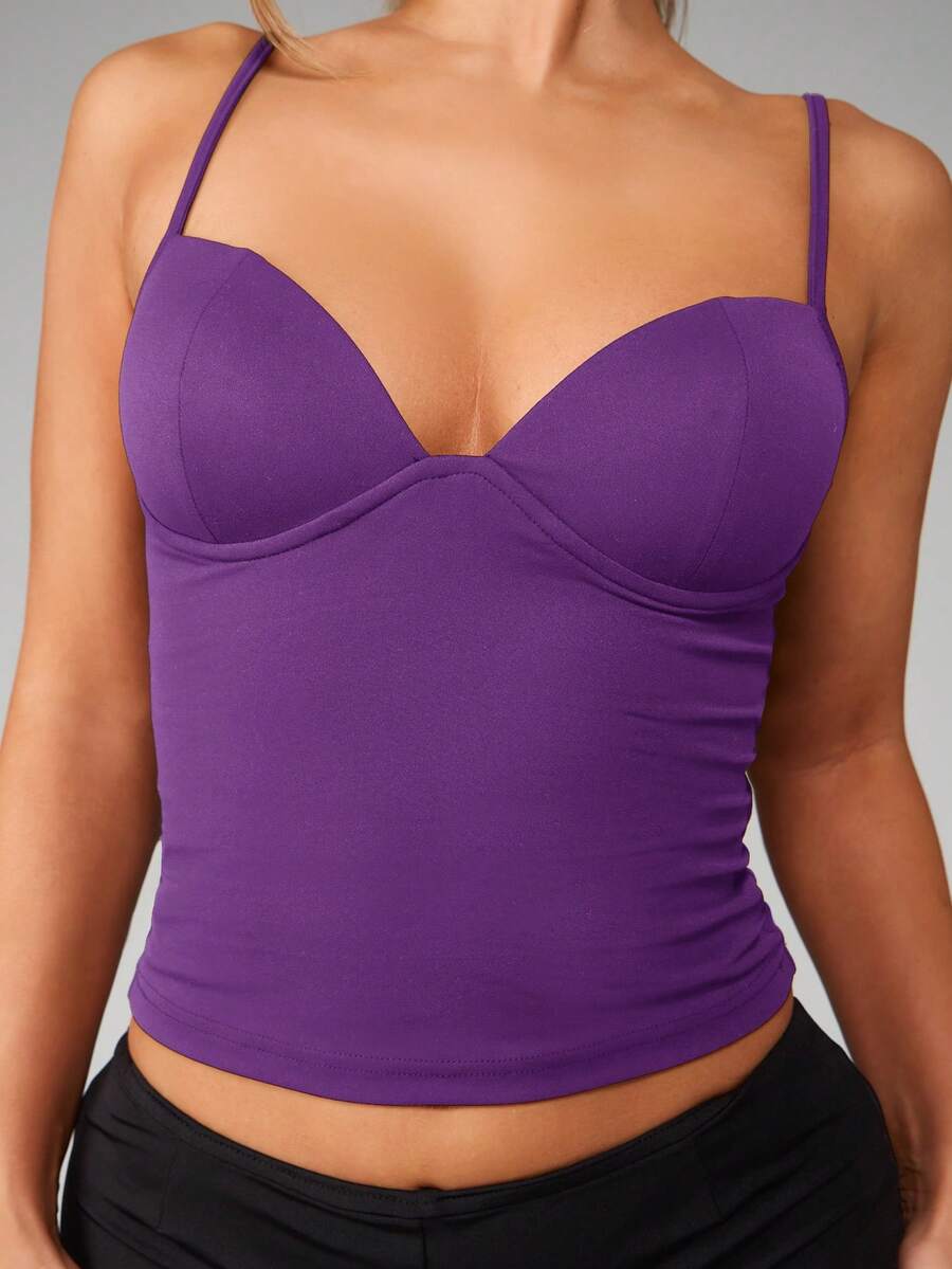 Women’s plain backless cami top with spaghetti straps and a slim fit, designed in high-stretch knitted fabric for casual beach and vacation wear.