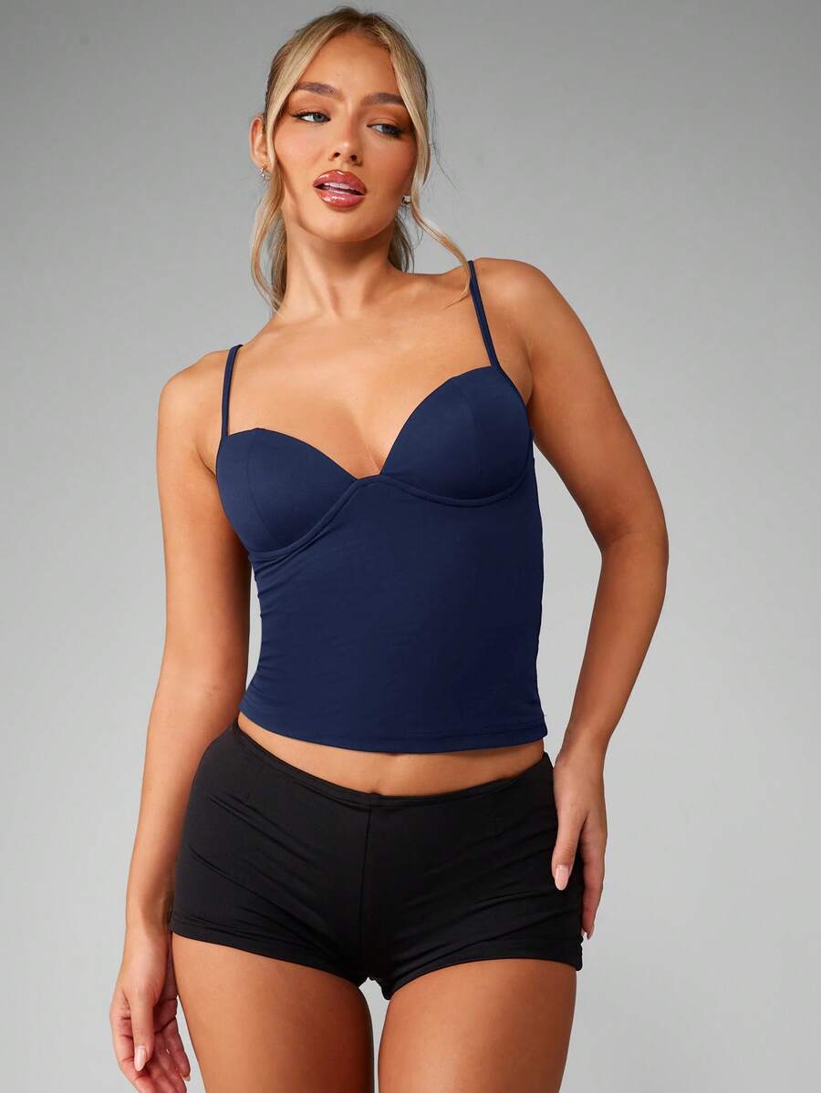 Women’s plain backless cami top with spaghetti straps and a slim fit, designed in high-stretch knitted fabric for casual beach and vacation wear.