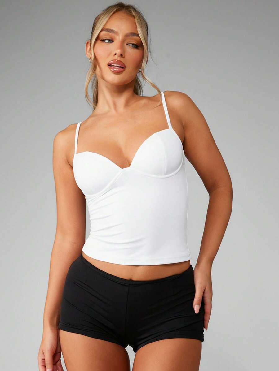 Women’s plain backless cami top with spaghetti straps and a slim fit, designed in high-stretch knitted fabric for casual beach and vacation wear.