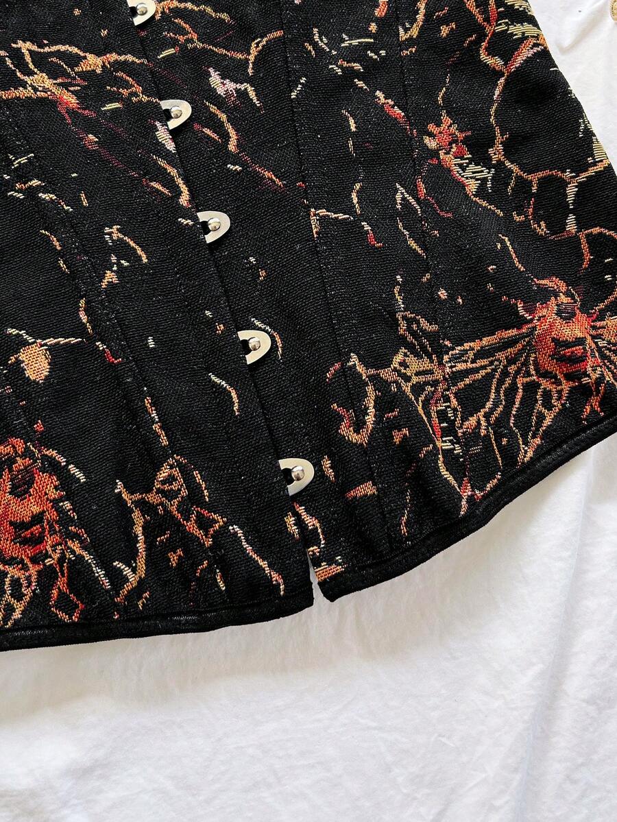 Strapless black lace-up corset top for women with grommet eyelet details, slim fit, lined body, and woven fabric construction.