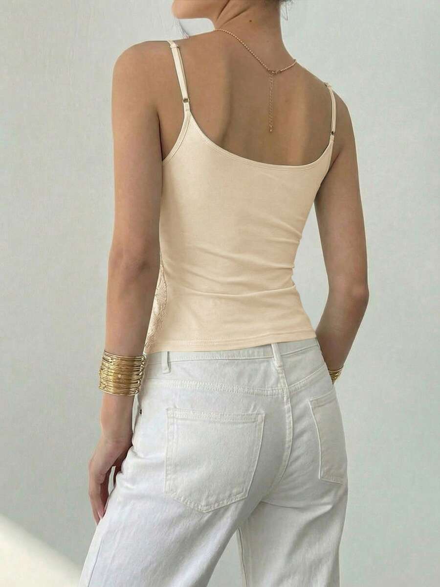 Women's sequin camisole top with spaghetti straps and a 3D rose embellishment