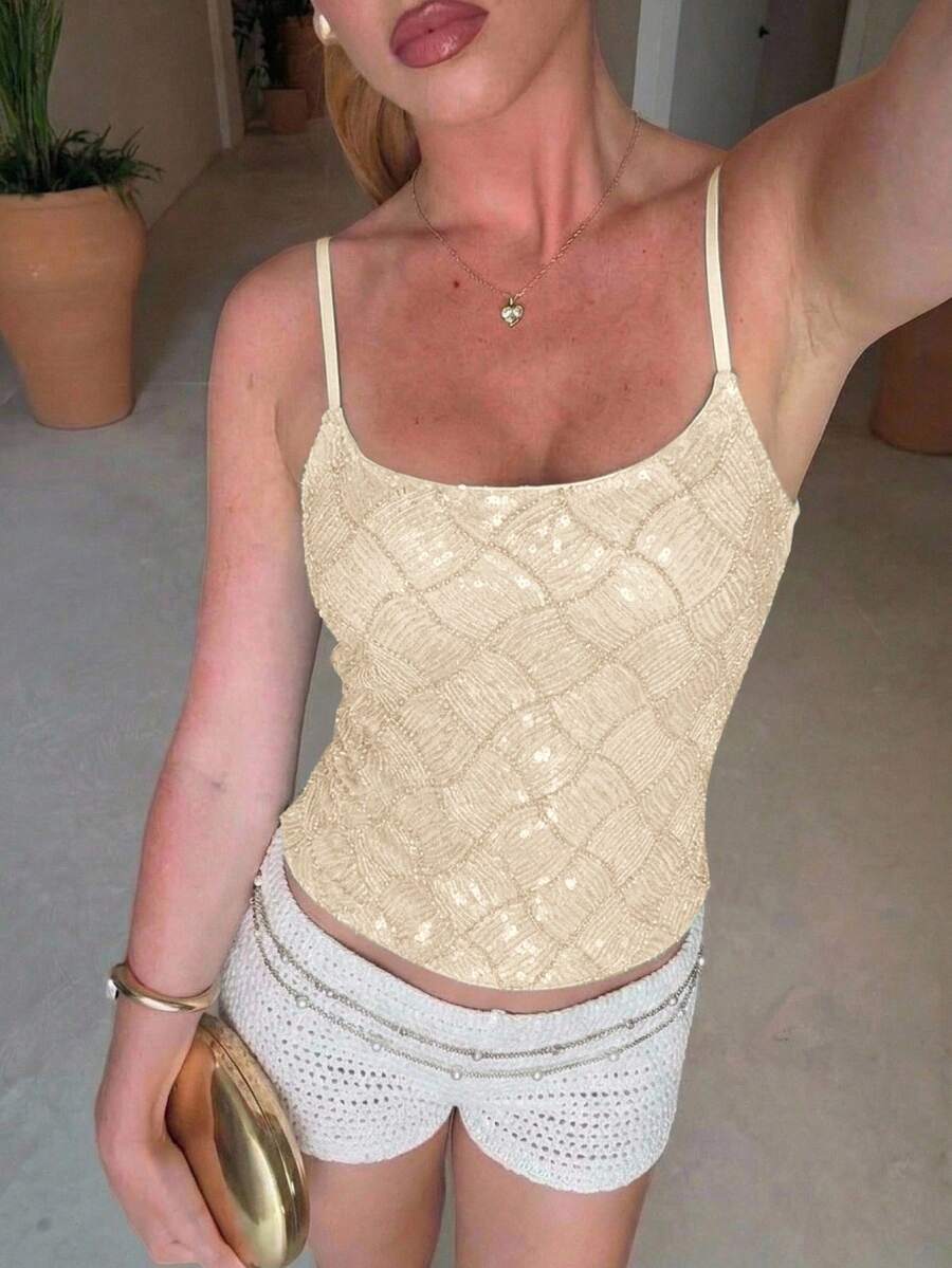 Women's sequin camisole top with spaghetti straps and a 3D rose embellishment