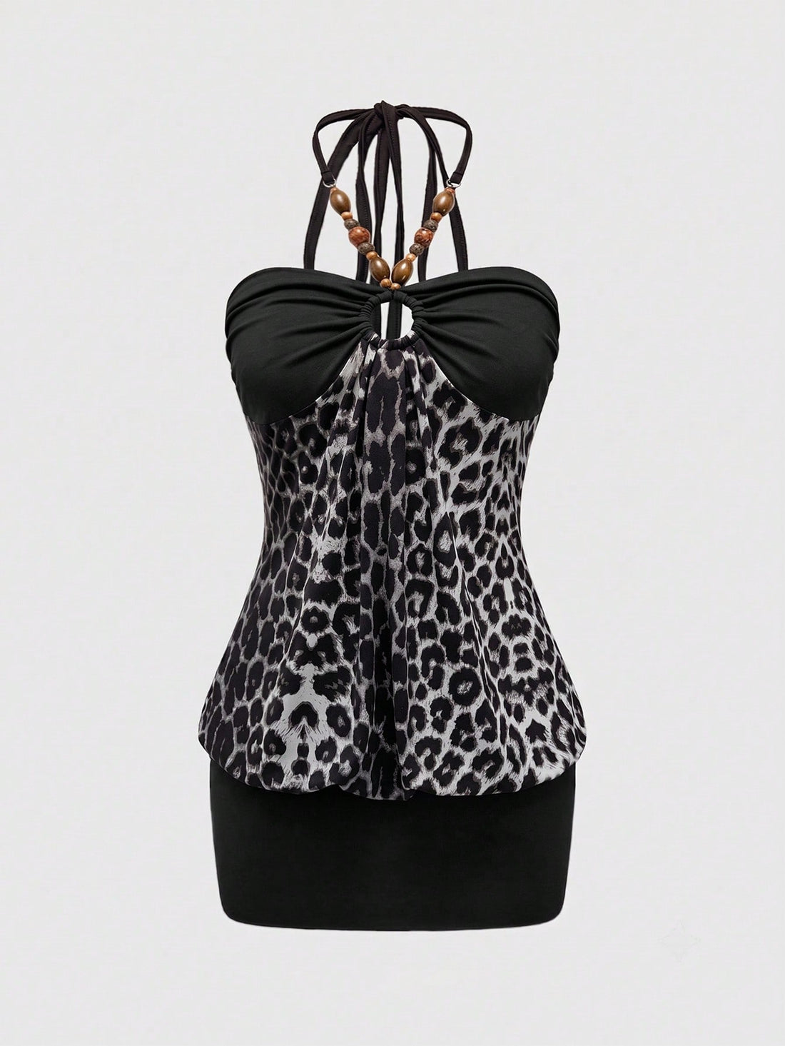 Women's black Y2K halter neck backless bodycon mini dress featuring beaded decor, textured patchwork pattern, natural waist, and slim fit pencil hem.