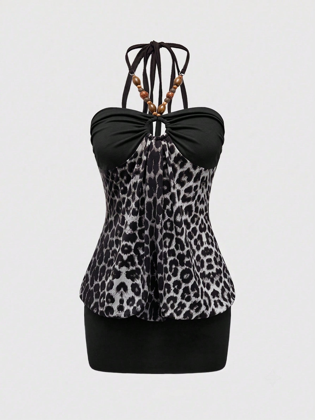 Women's black Y2K halter neck backless bodycon mini dress featuring beaded decor, textured patchwork pattern, natural waist, and slim fit pencil hem.