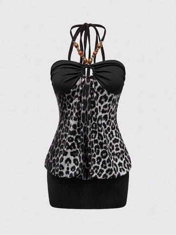 Women's black Y2K halter neck backless bodycon mini dress featuring beaded decor, textured patchwork pattern, natural waist, and slim fit pencil hem.