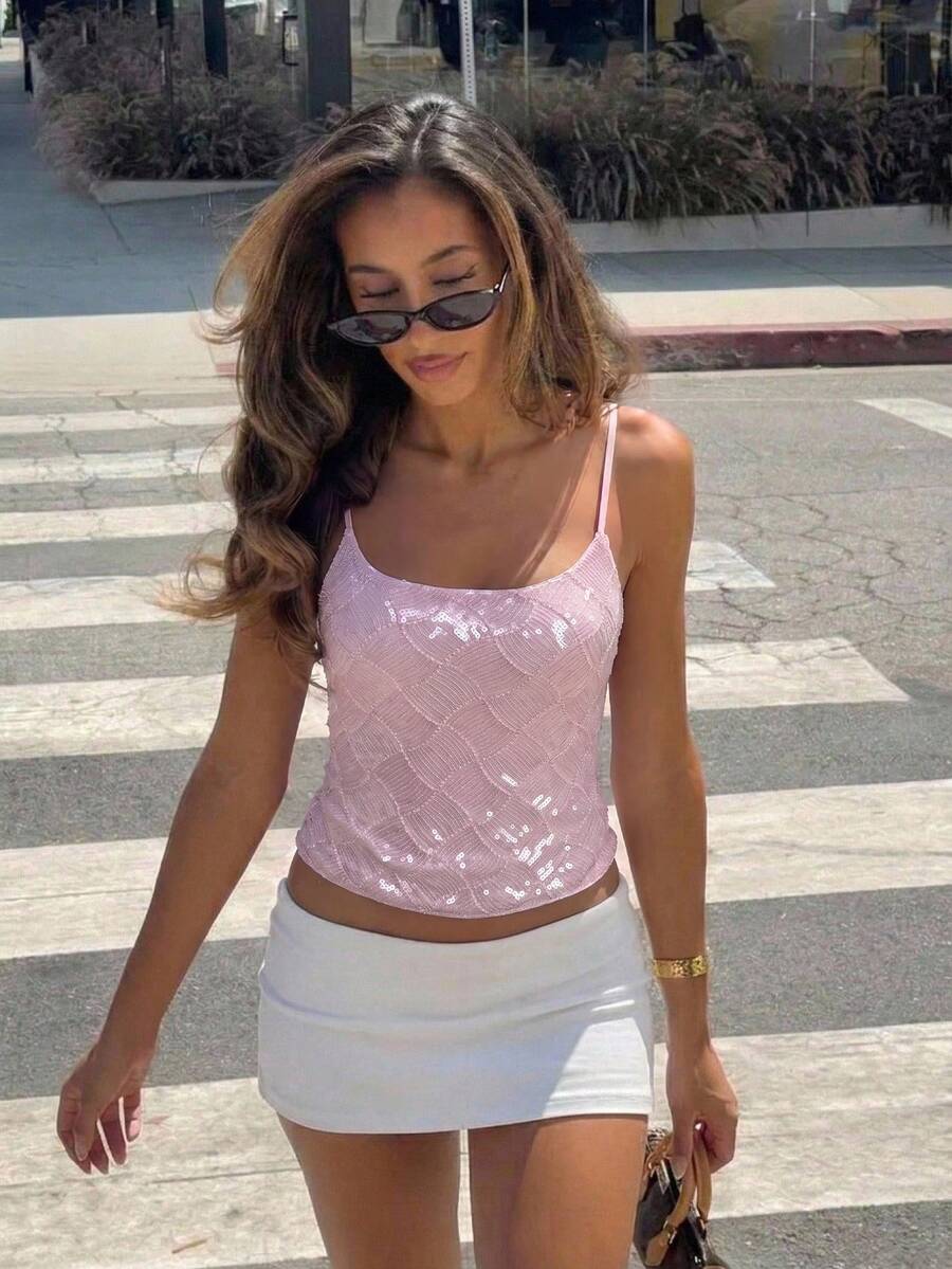 Women's sequin camisole top with spaghetti straps and a 3D rose embellishment